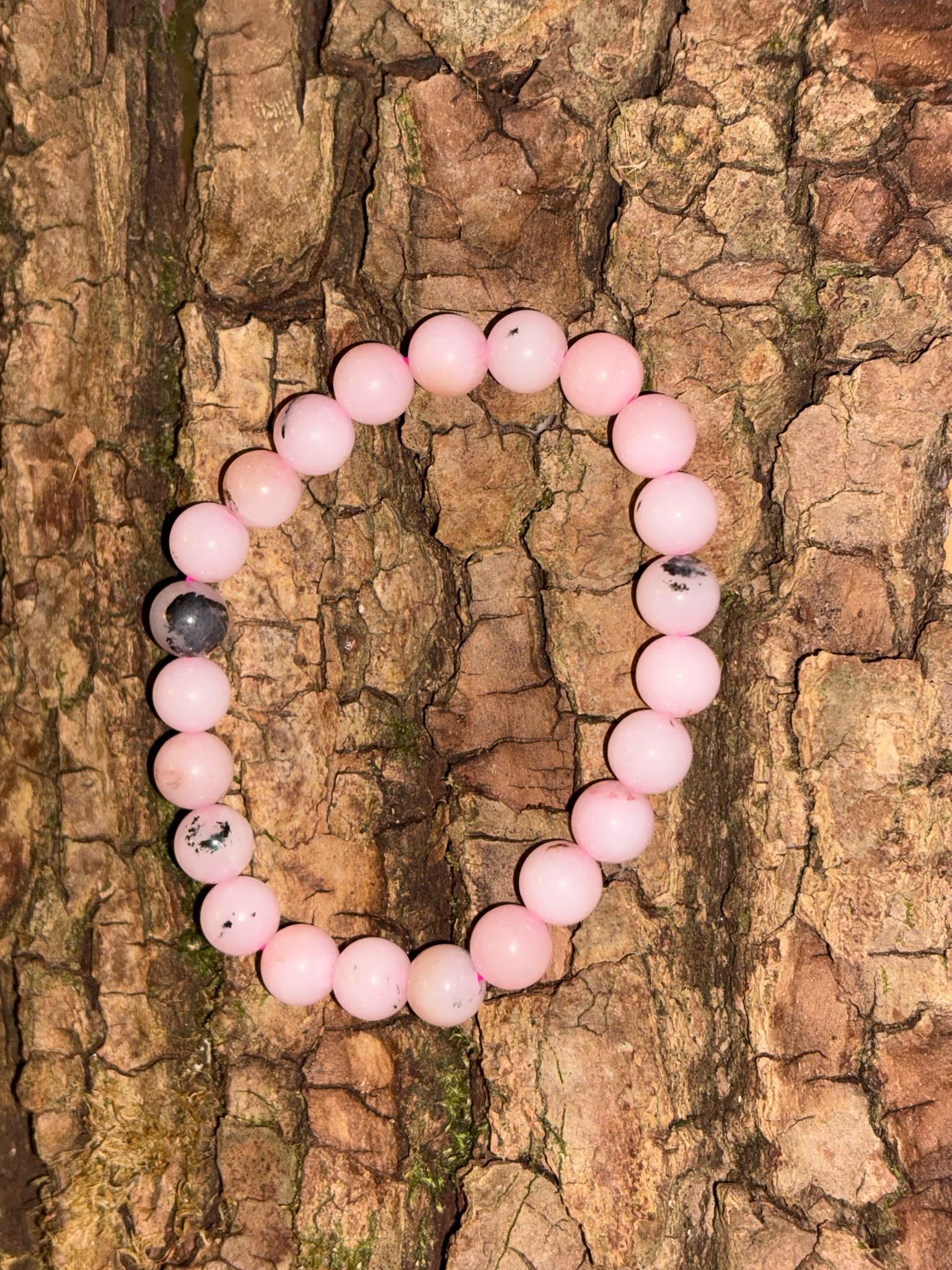 Bracelet boule opale rose chauffée